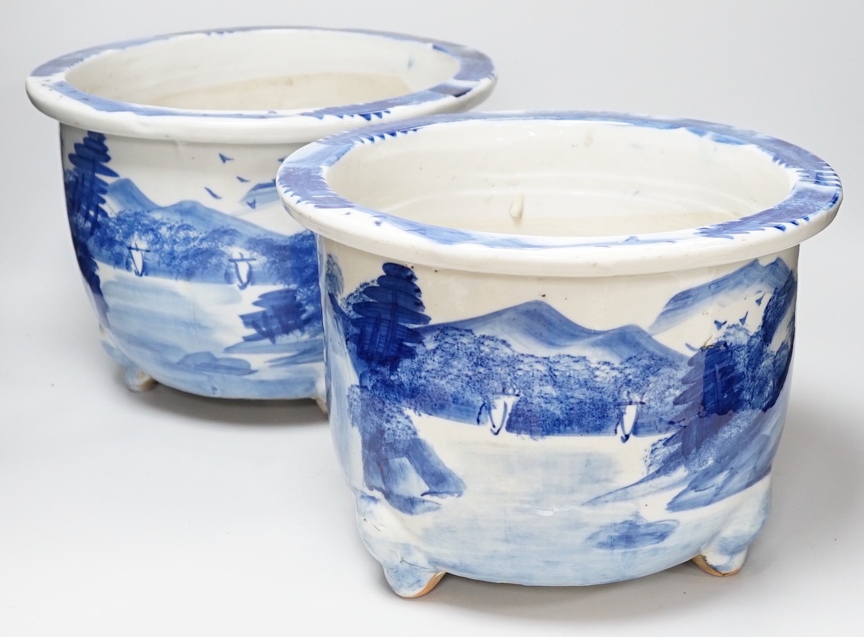 A pair of Japanese blue and white jardinieres, 31cm diameter